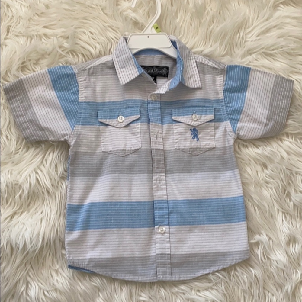 Lightly worn boy button down shirt.